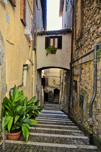 Fototapeta Naklejka Na Ścianę i Meble -  An alley among the old houses of Fiuggi, a medieval village in the Lazio region.