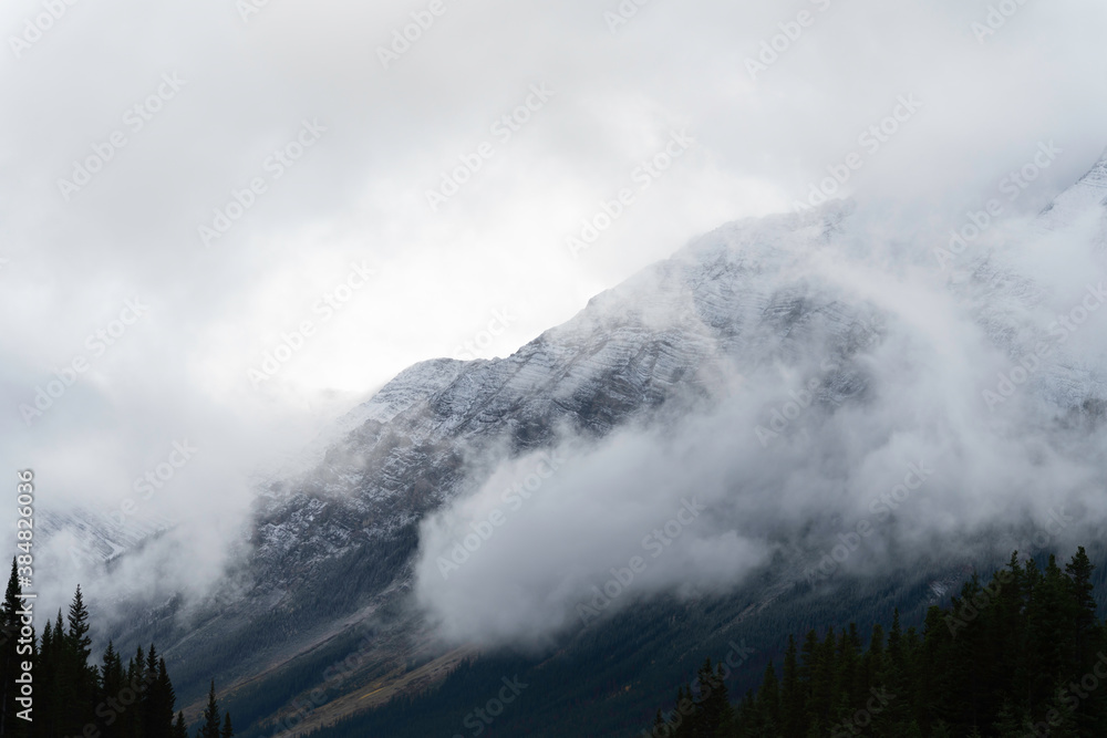 Mountain tops covered with mist in the rockies