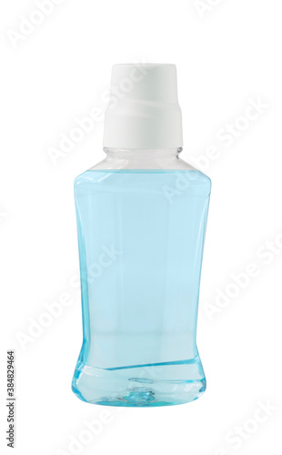 Transparent bottle with blue oral rinse for fresh breath and dental care isolated on white background