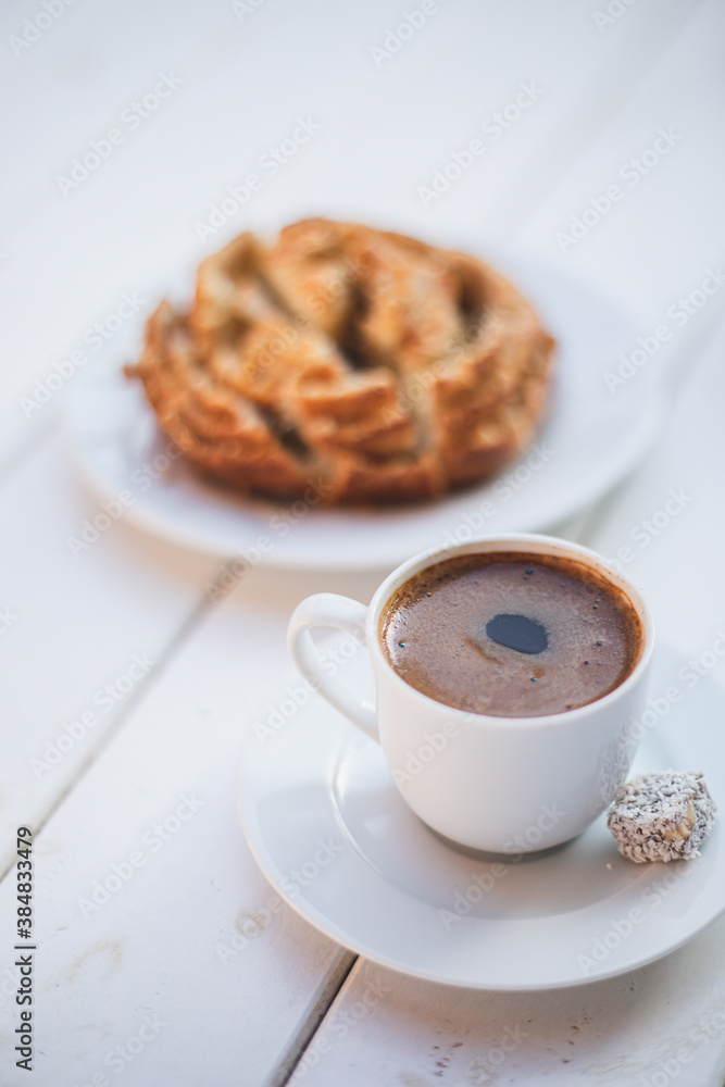 Turkish coffee and tahini donut on a white background. Turkish coffee and tahini donut on a white background.
