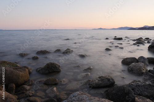 Wallpaper Mural Rocky stretch of coast of the Mediterranean Sea on the Greek Aegean island of Samos with a calm water surface. Torontodigital.ca