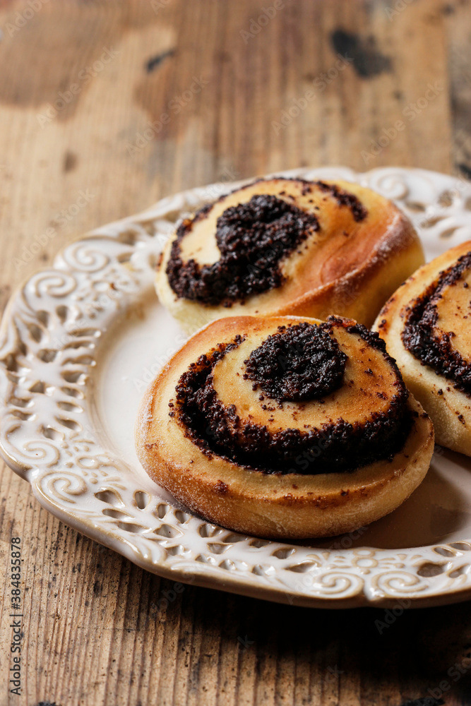 Homemade poppy-seed rolls on the table. Homemade poppy-seed rolls on the table.