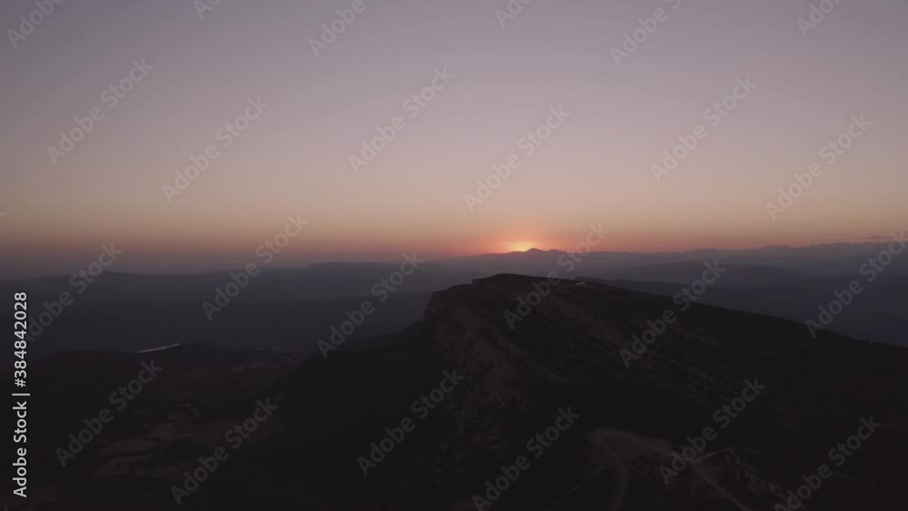 Sunset sky over mountain ridge in highland Sunset sky over mountain ridge in highland