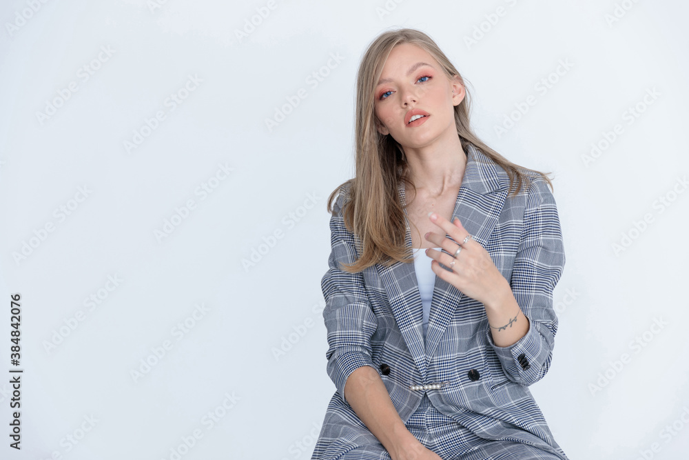 Charming businesswoman wearing suit and explaining Charming businesswoman wearing suit and explaining