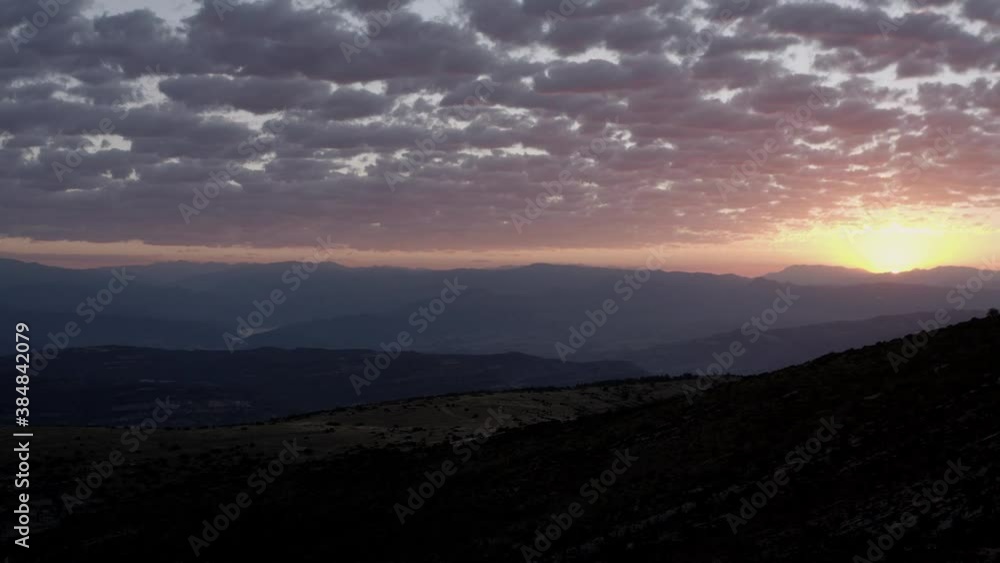 Sunset sky over mountain ridge in highland Sunset sky over mountain ridge in highland