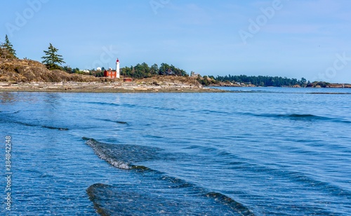 fisgart lighthouse the shore of the sea - Colwood, Vancouver island, British Columbia, Canada  photo