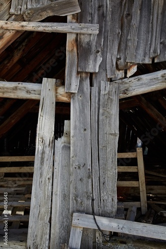 Attic of an abandoned house falling apart wooden structure