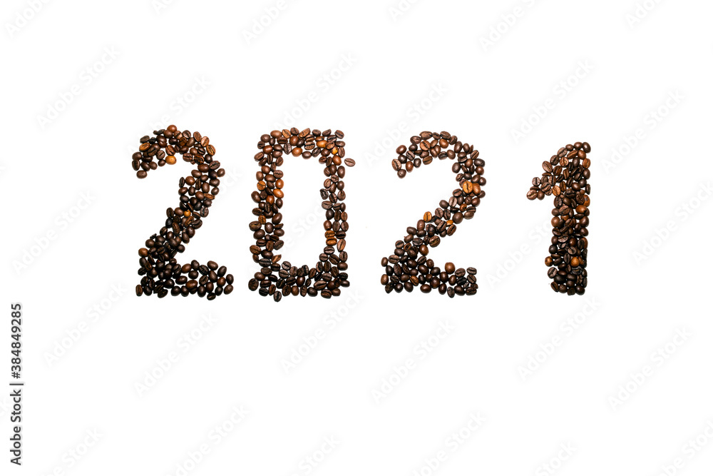 2021 laid out from coffee beans on a white background. christmas coffee house concept 2021 laid out from coffee beans on a white background. christmas coffee house concept