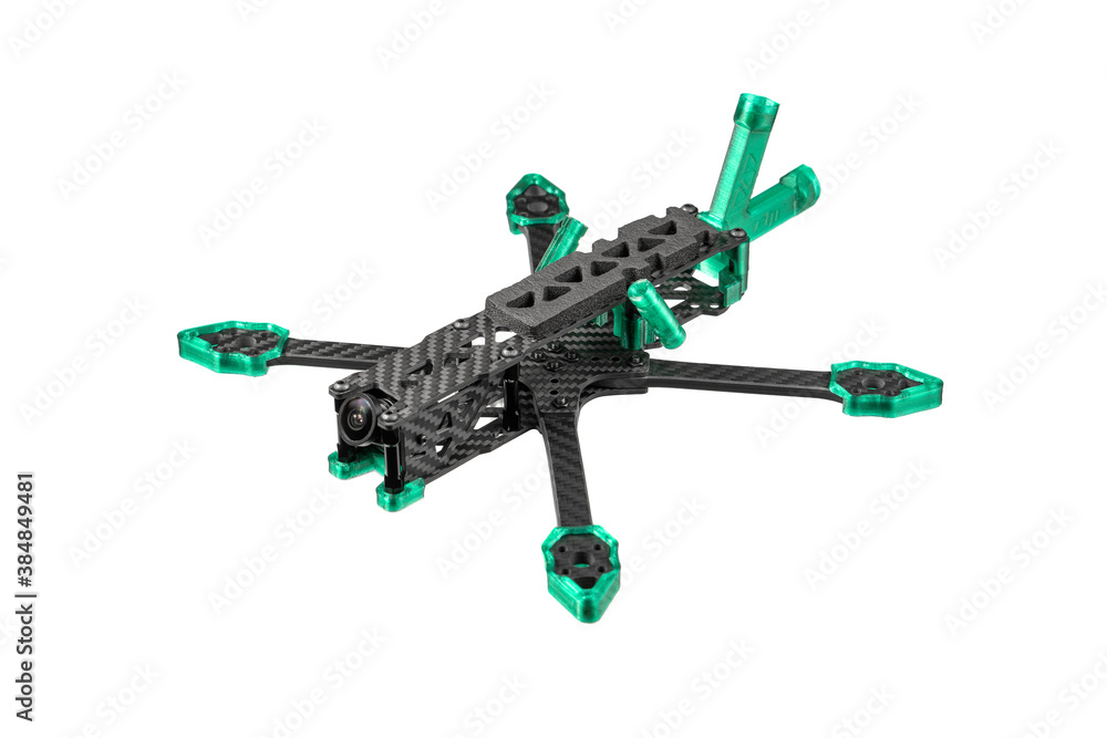 Carbon frame for FPV racing drone isolate on white background. Assembling the quadcopter Carbon frame for FPV racing drone isolate on white background. Assembling the quadcopter