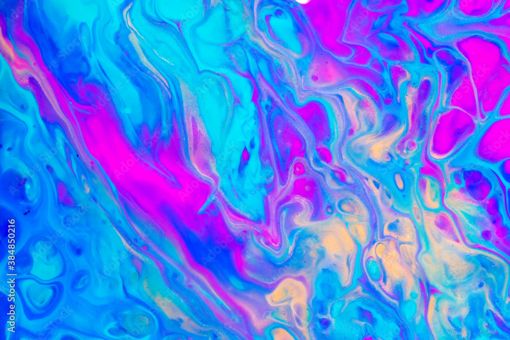 Colorful mix of acrylic vibrant colors. Fluid painting abstract texture.