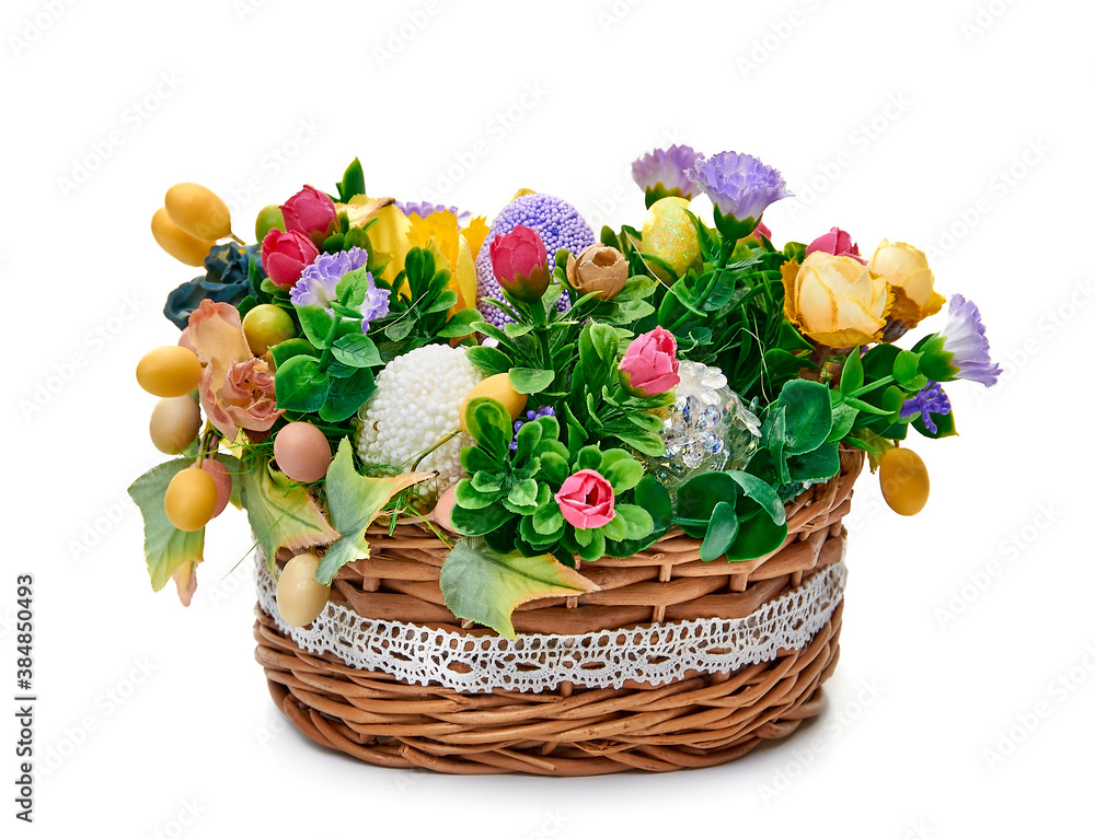 Easter basket from a flower arrangement on white background