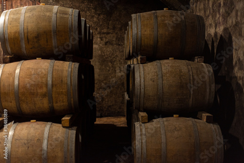 Wallpaper Mural Wooden barrels for wine aging in the cellar. Italian wine. Torontodigital.ca