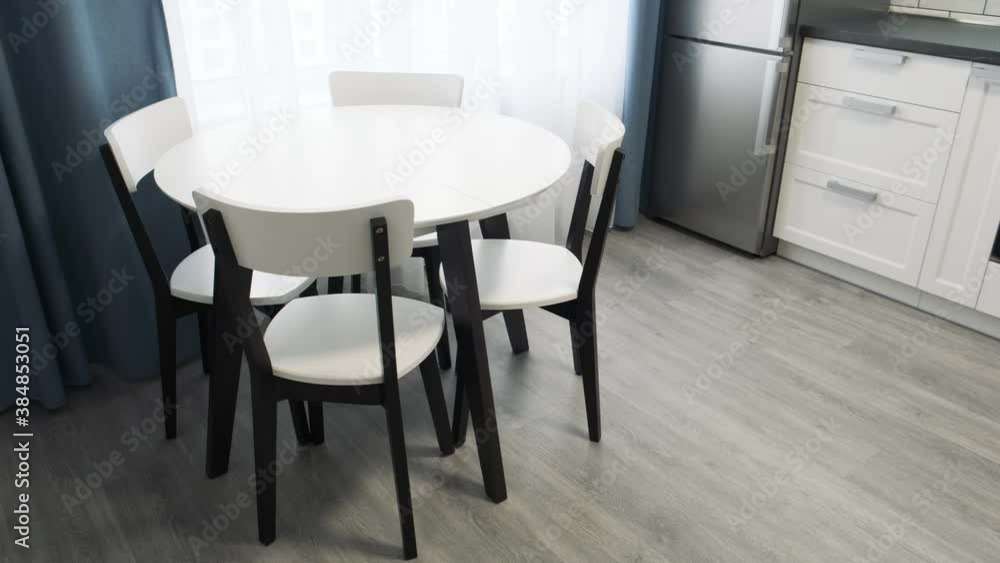 Black and white dining table. Scandinavian design minimalist kitchen