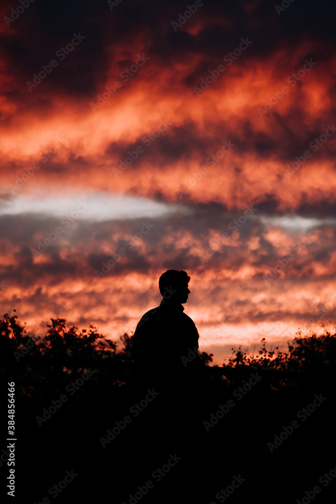 Man's Silhouette Against Sunset Man's Silhouette Against Sunset