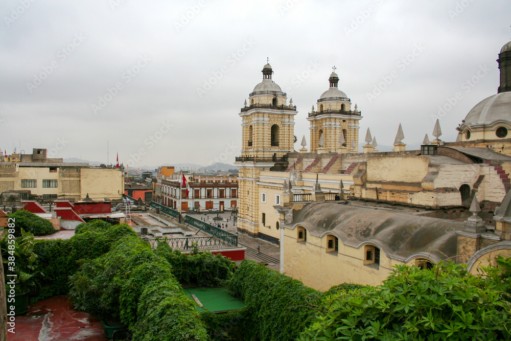 Top view on roofs and heritage buildings of old Lima city center in cloudy day