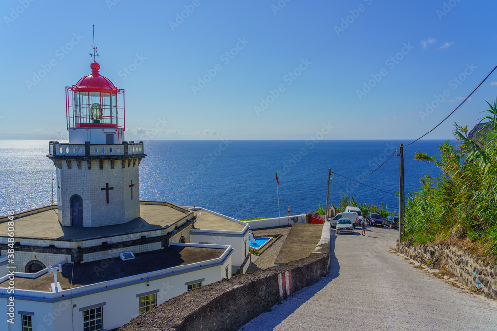 The Lighthouse Ponta do Arnel near Nordeste town in Sao Miguel The Lighthouse Ponta do Arnel near Nordeste town in Sao Miguel