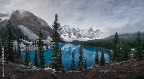 Wenkchemna Peaks Or Ten Peaks Rising Over Moraine Lake In The Snow, Near Lake Louise, Banff National Park, Alberta, Canada, North America photo