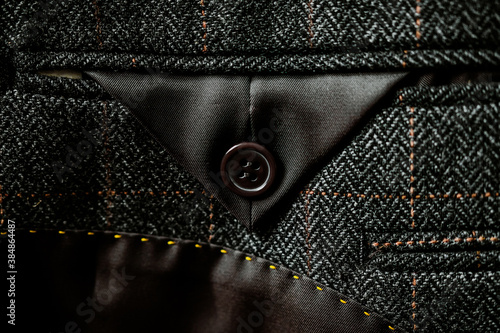 detail of a gray man suit photo