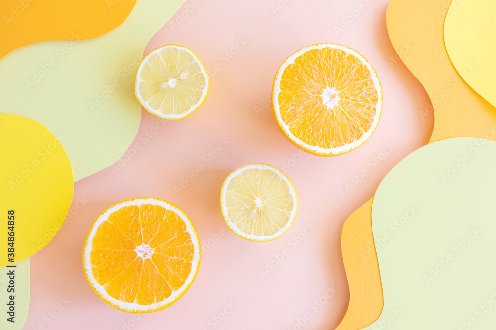 Halved lemons and oranges on vibrant colored wave backgrounds. Paper art style on photo. Concept of citrus, vitamin C, fruit. - obrazy, fototapety, plakaty 