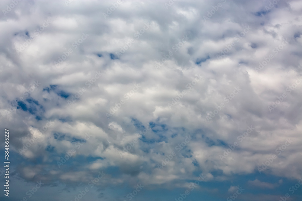 Cloudscape with white clouds against blue sky Cloudscape with white clouds against blue sky
