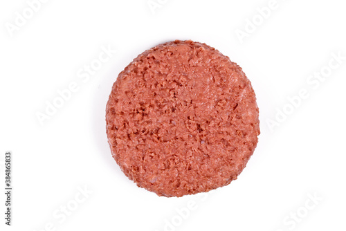 Raw round vegan soy based burger patty isolated on white background 
