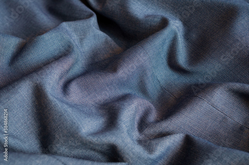 Crumpled light blue fabric for background