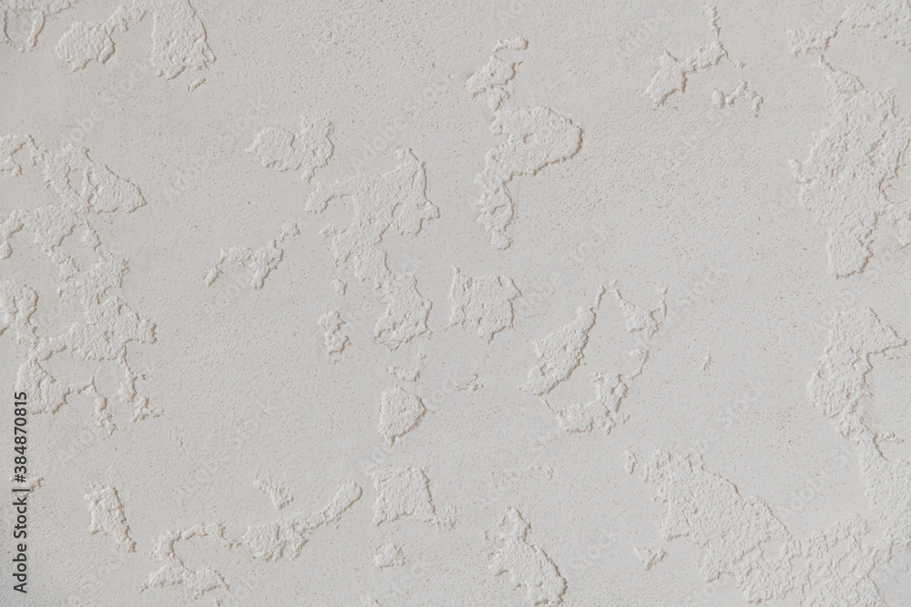 Fototapeta premium Abstract textured background. Close up view of concrete wall covered with gray plaster. Copy space for your text.