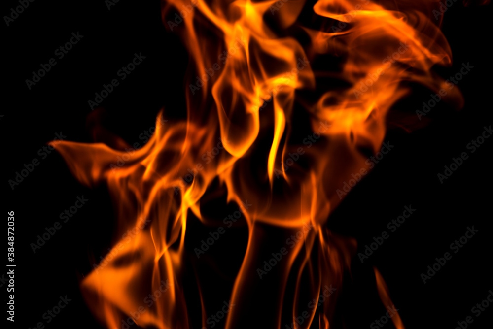 Fire flames abstract on black background. Fire and burning flame on dark background Fire flames abstract on black background. Fire and burning flame on dark background