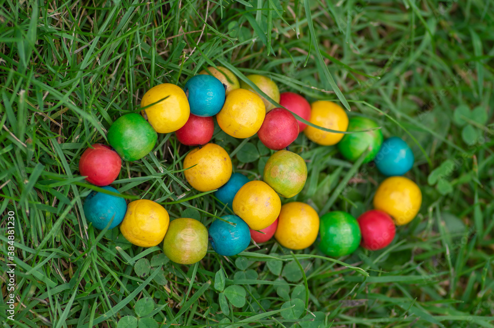 Colorfull wood beads on thread, fashionable beaded bracelets, bright beautiful colors green red yellow and light blue Colorfull wood beads on thread, fashionable beaded bracelets, bright beautiful colors green red yellow and light blue