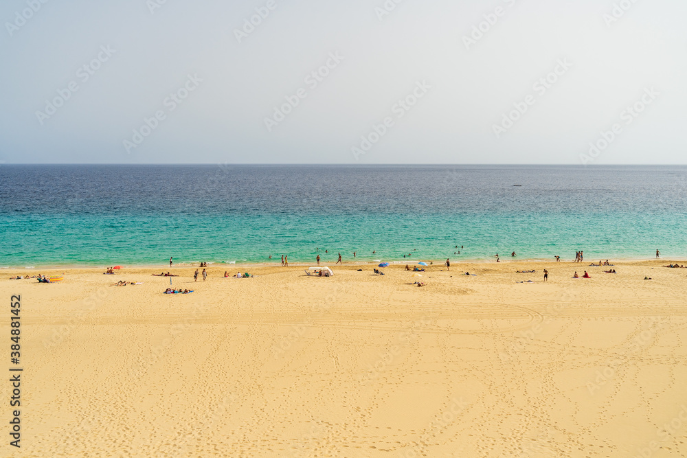 Uncrowded but once popular sandy beach. Morro Jable. Fuerteventura, Canary Islands. Spain. Summer 2020. Consequences of the Tourism Industry Crisis Due to COVID-19.