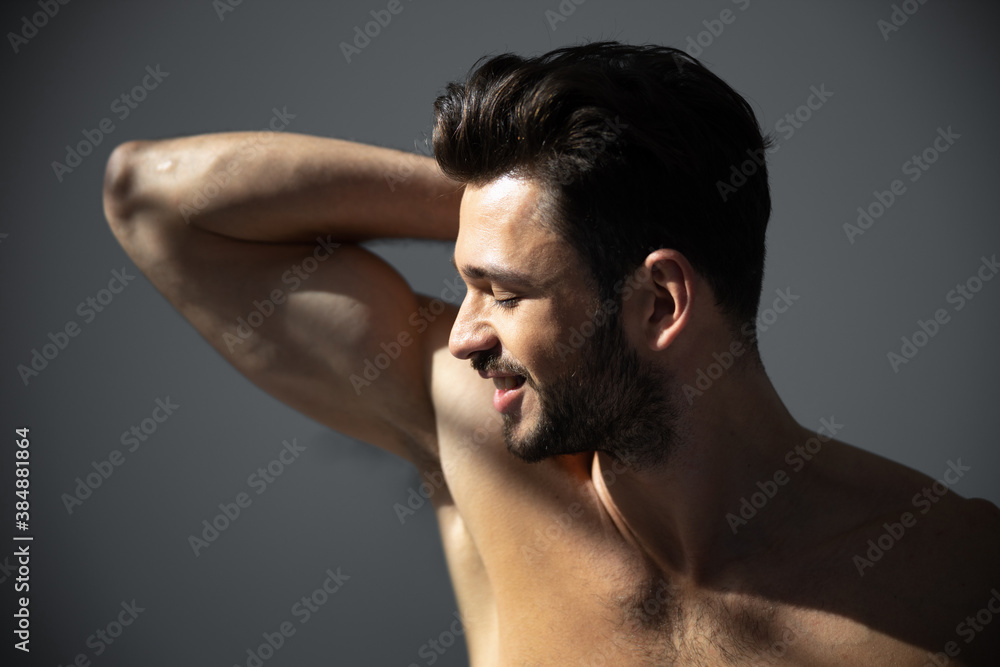 Cropped shot of handsome smiling man with beard Cropped shot of handsome smiling man with beard