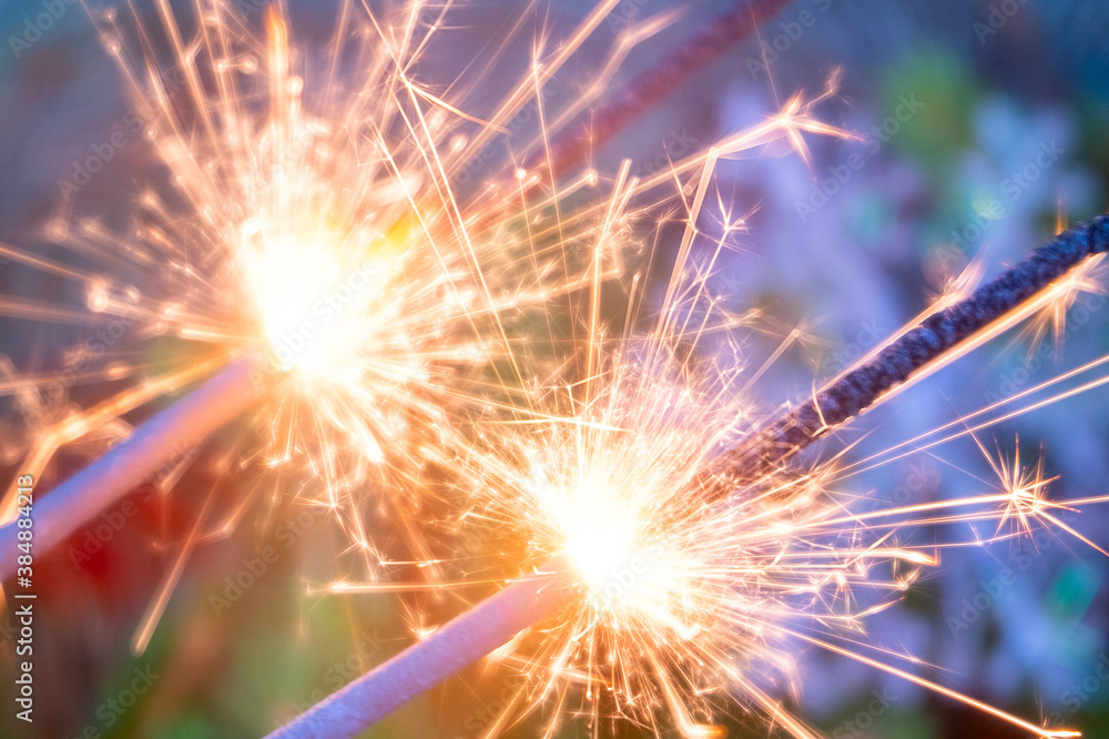 Obraz premium Christmas sparkler with background Christmas light bokeh