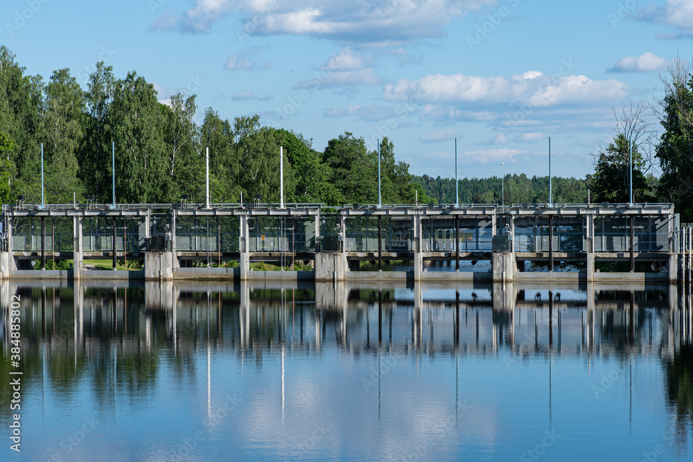 Watergates damming up a river at a hydroelectric power plant in Sweden