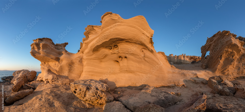 Small mound of eroded sand on a stone floor, in Formentera Spain
