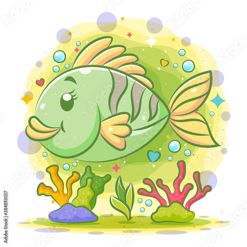 Little green clown fish swim under the beautiful sea