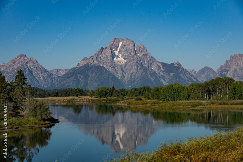 Jenny Lake Trail in Grand Teton National Park, Wyoming. USA. Back to Nature concept. Jenny Lake Trail in Grand Teton National Park, Wyoming. USA. Back to Nature concept.