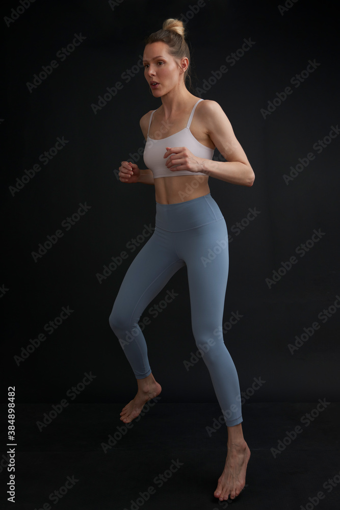 Fitness model demonstrates movement Fitness model demonstrates movement
