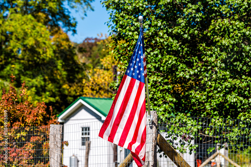 Bartow town in West Virginia countryside rural and American Flag closeup by house building in Durbin Frank area