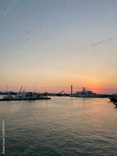 sunset over the harbor © tatyana