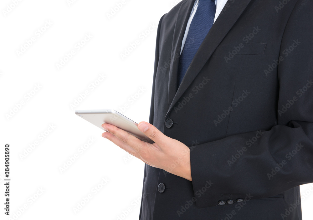 Close-up shot of a man in a black suit holding a tablet Close-up shot of a man in a black suit holding a tablet