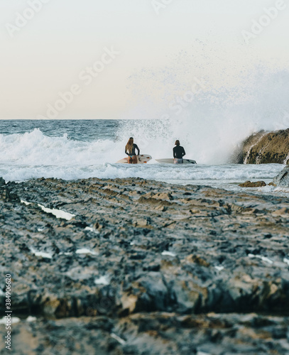 Surfers getting ready to go in at snapper rocks, Queensland  photo