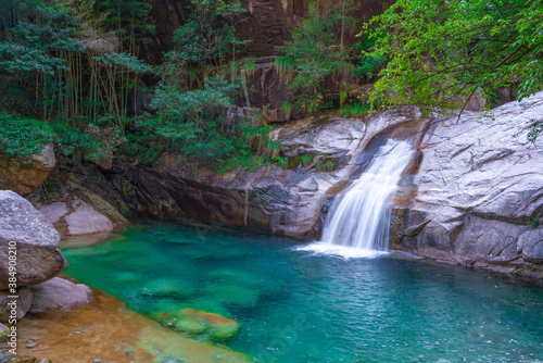 The turquoise color water creek and waterfalls in Emerald Valley  in Anhui province  China.