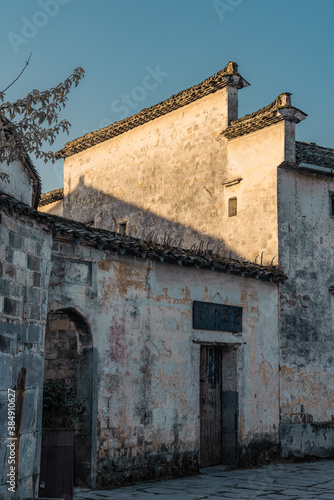 Sunrise view of the streets and architectures in Xidi village, an ancient Chinese village in Anhui Province, China, a UNESCO world cultural heritage site. © Zimu
