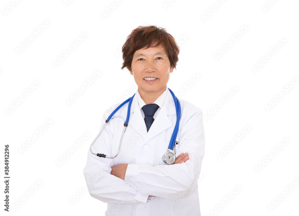 Female hospital doctor looking at camera with cross-handed smile in front of white background