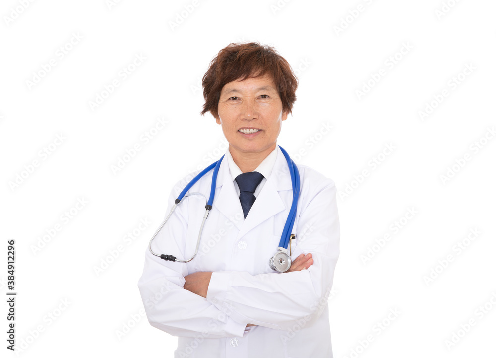 Female hospital doctor looking at camera with cross-handed smile in front of white background Female hospital doctor looking at camera with cross-handed smile in front of white background