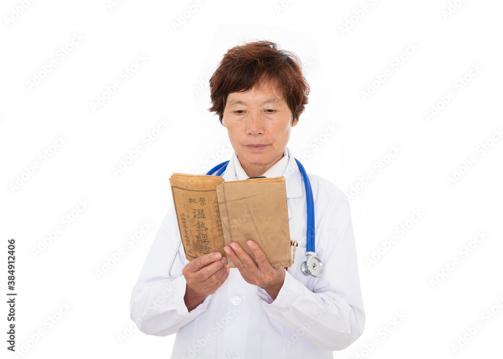Doctor in white coat in front of white background is reading and studying Doctor in white coat in front of white background is reading and studying