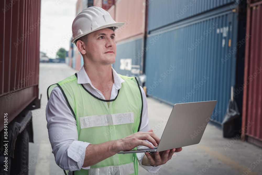 Container Supervisor Control Import/Export While Inspecting Containers Box in Warehouse Storage Distribution. Container Logistics Shipping Controlling of Transportation Industry, Cargo Ship Factory Container Supervisor Control Import/Export While Inspecting Containers Box in Warehouse Storage Distribution. Container Logistics Shipping Controlling of Transportation Industry, Cargo Ship Factory