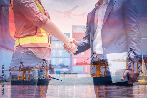 Double Exposure of Businessman and Container Shipping Worker Greeting Handshake Together With Containers Cargo Ship Port Terminal. Transportation Freight for Import/Export of Shipment Service Industry photo