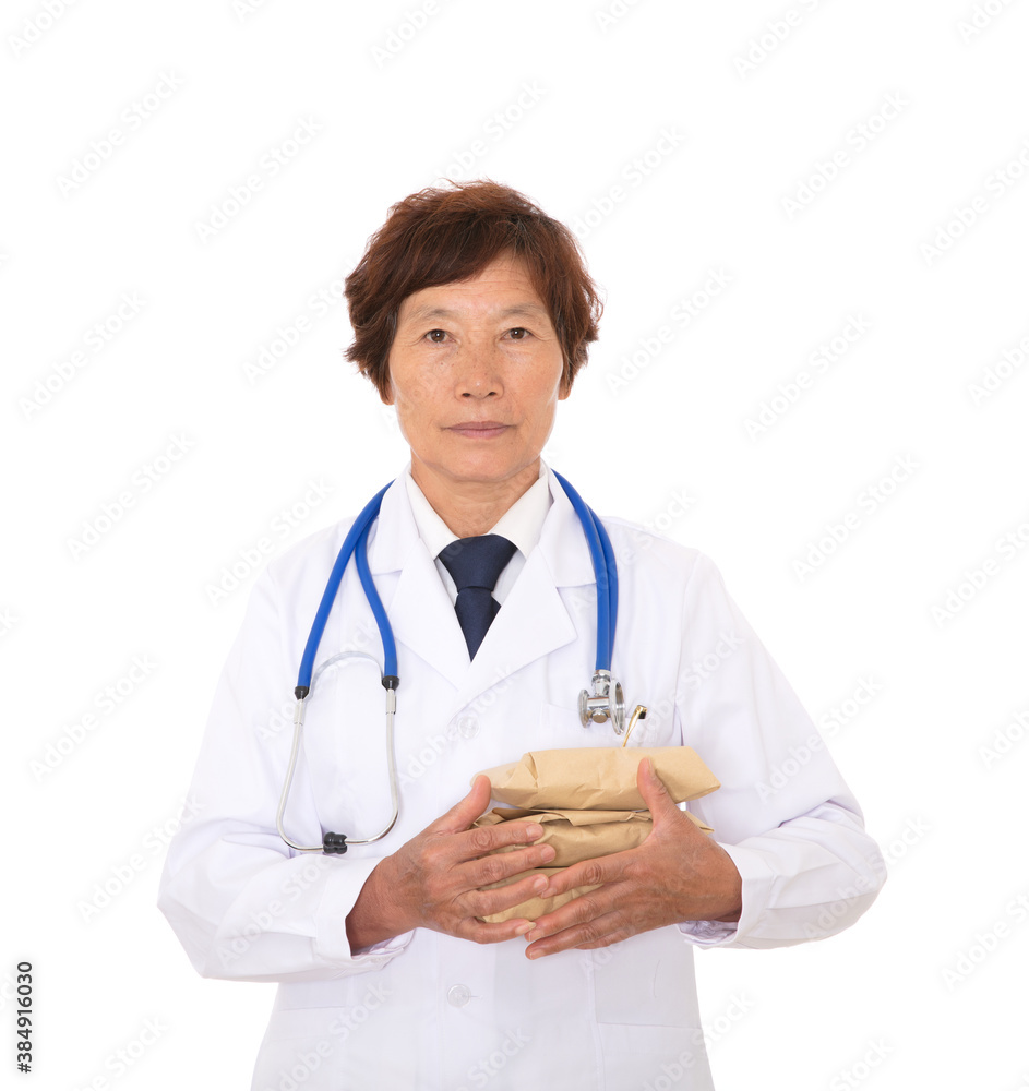 Doctor in white coat holding Chinese medicine in hand on white background Doctor in white coat holding Chinese medicine in hand on white background