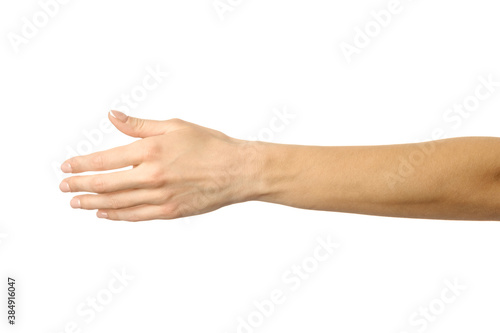 Giving hand for handshake. Woman hand gesturing isolated on white photo